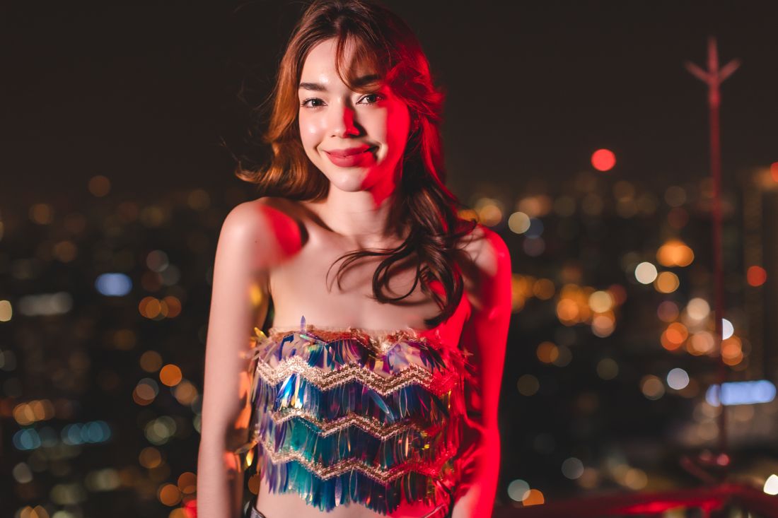 Night city portrait in neon-lit street light