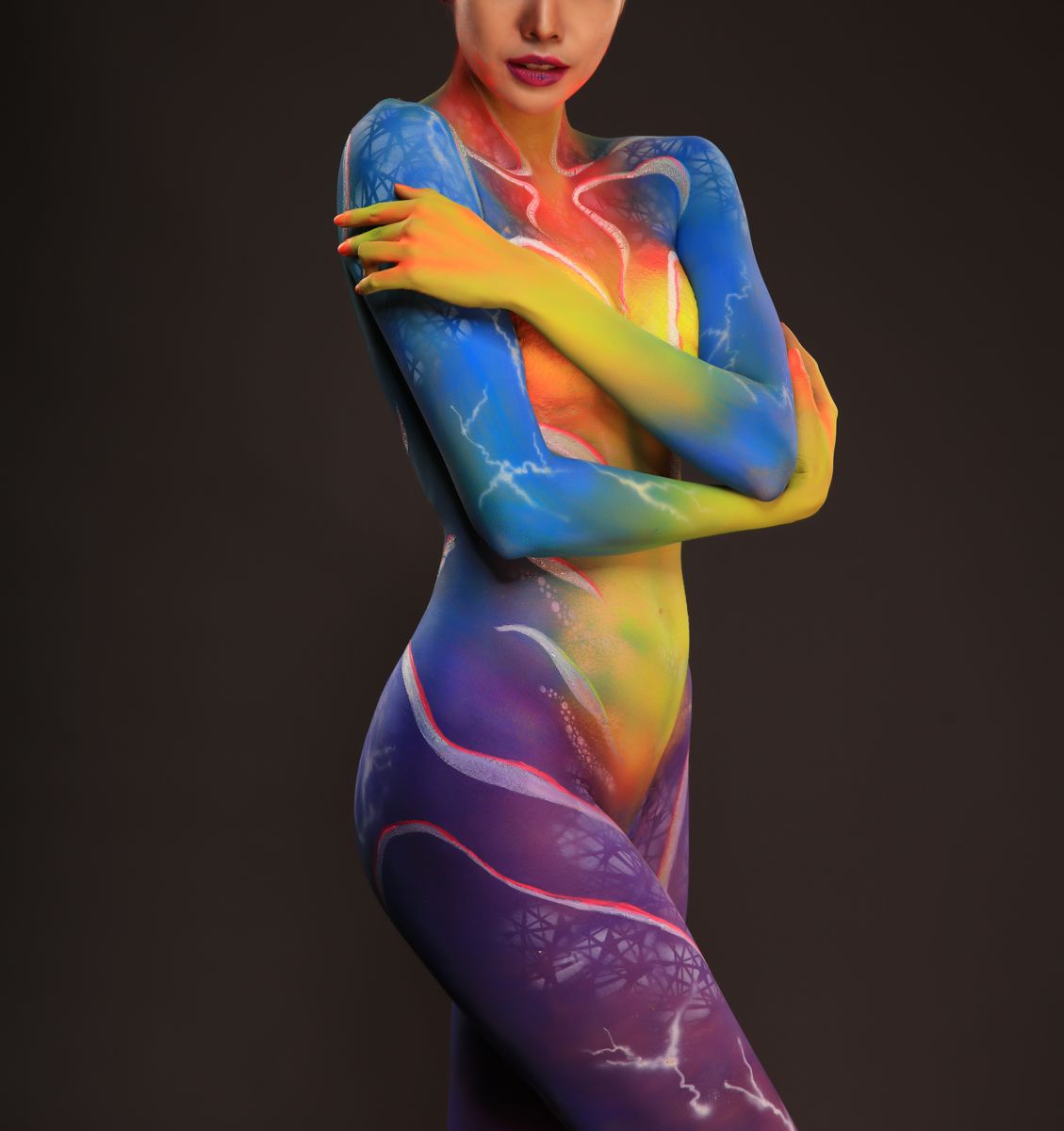 Artistic rainbow body paint, full figure