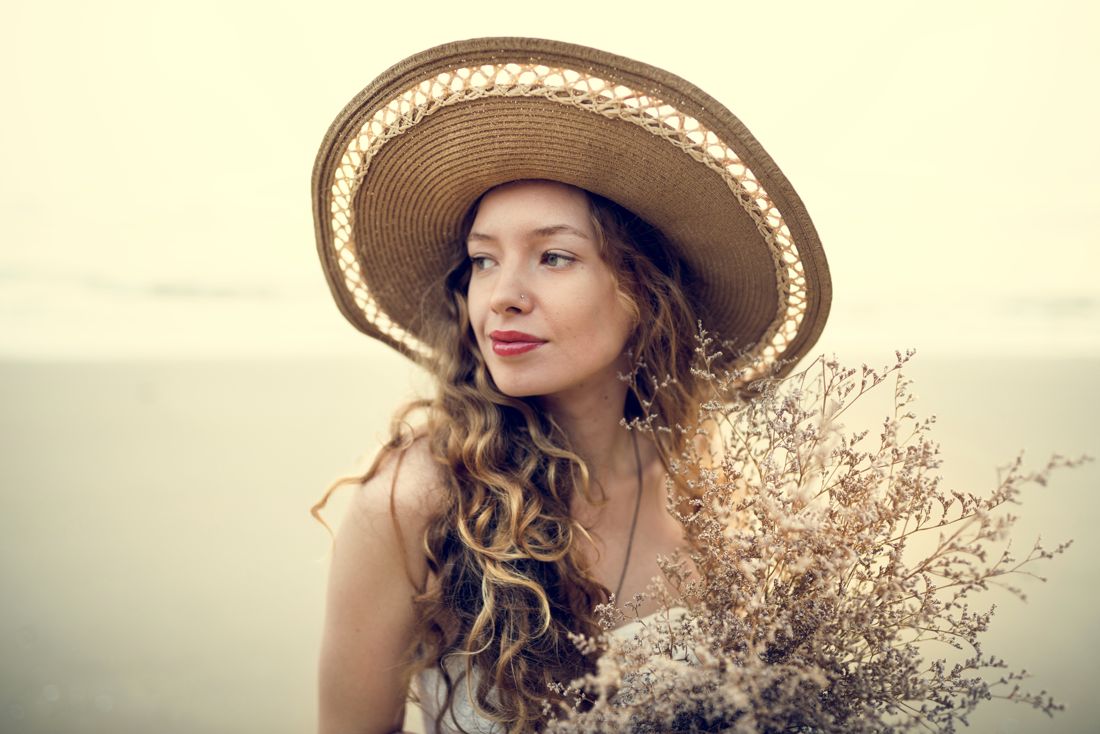 Boho look with hat among pampas grass