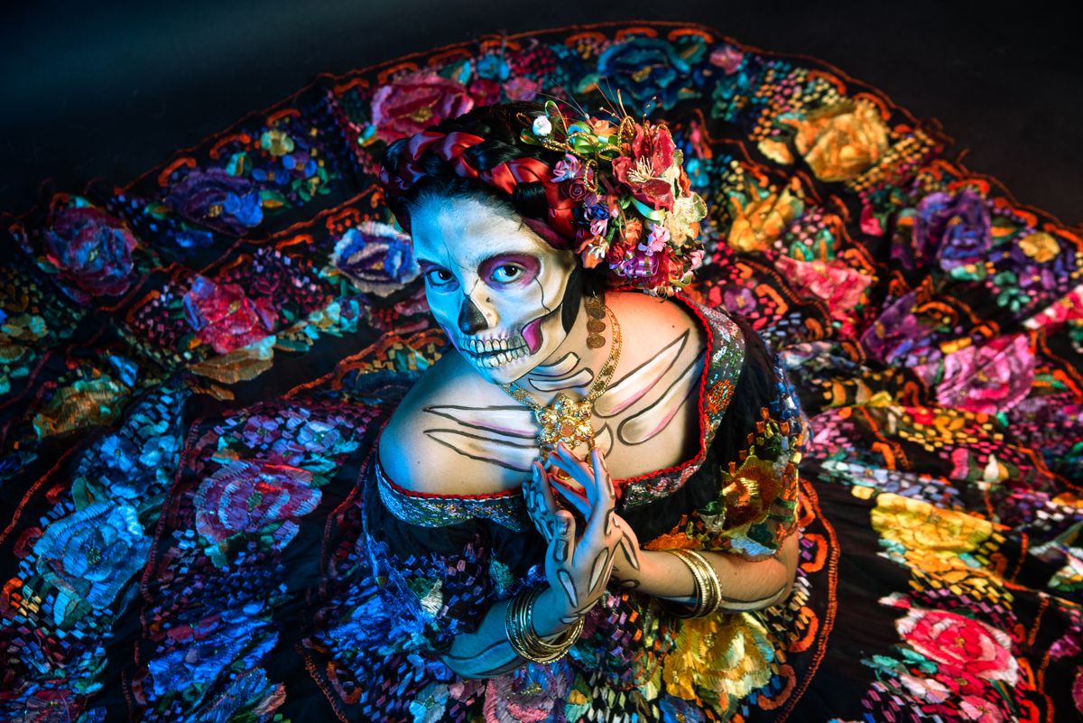 Calavera makeup with dark roses