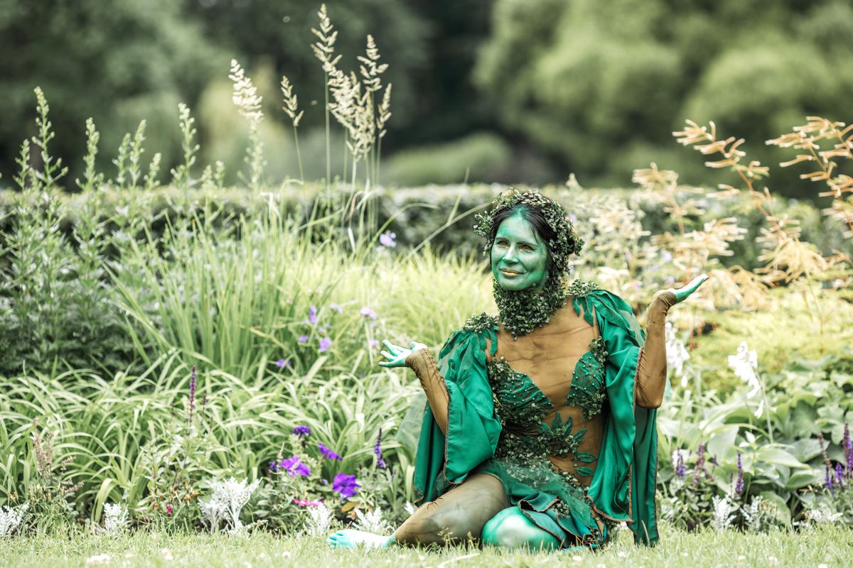 Mystical green dryad look in the forest