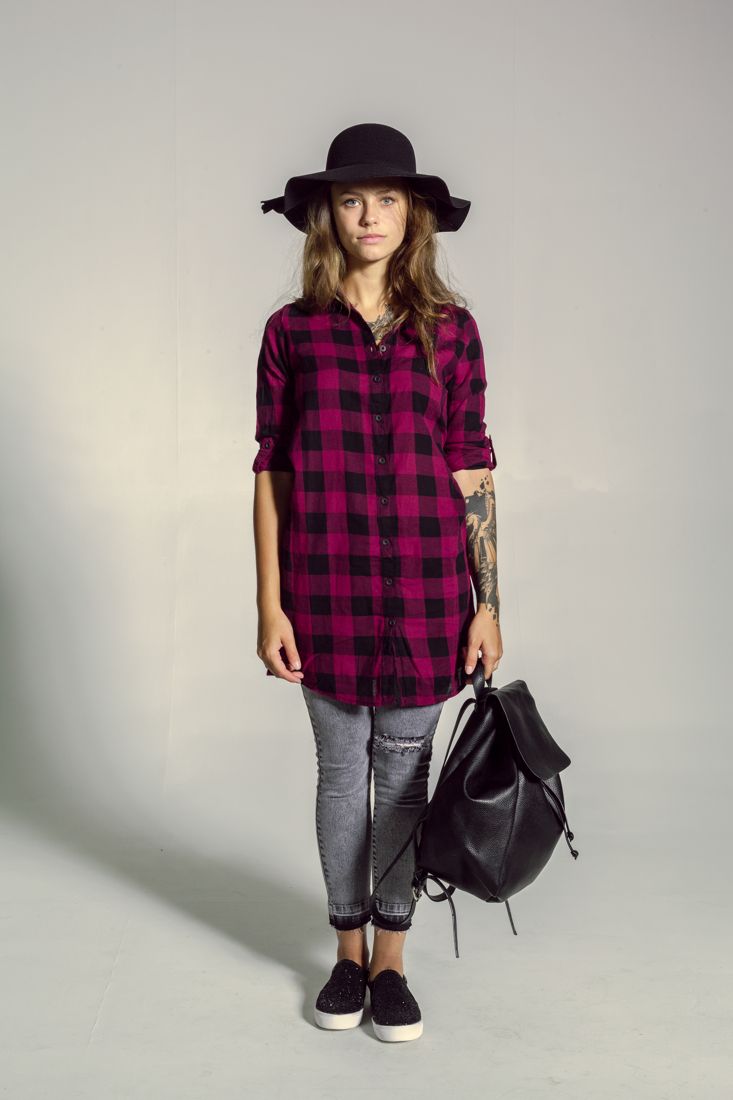 Grunge look in plaid shirt and beanie