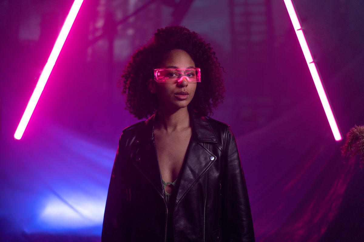Model in futuristic glasses with neon lights